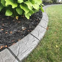 stamped concrete curb for landscaping by ProScapes 