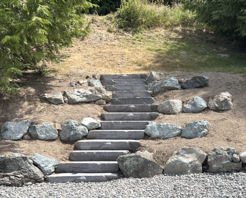 landscaping steps integrated into design and installed on a slope